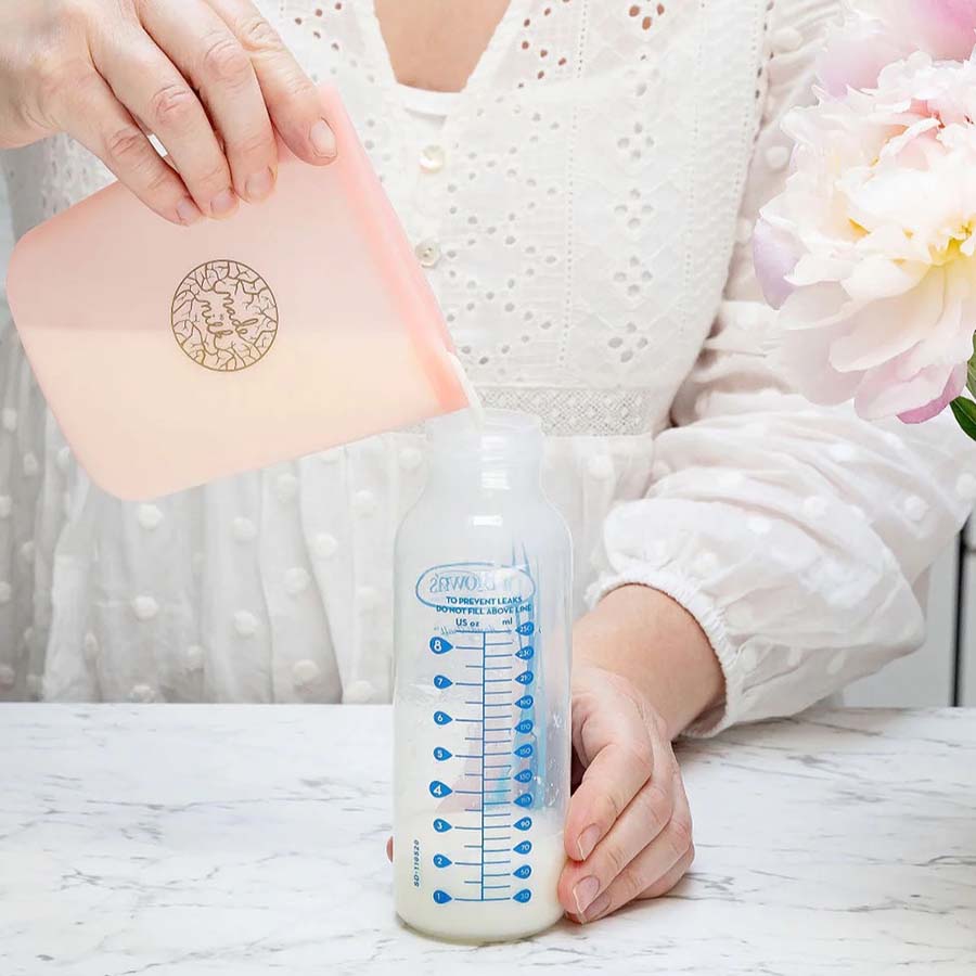 Pouring breast milk from bag hot sale to bottle