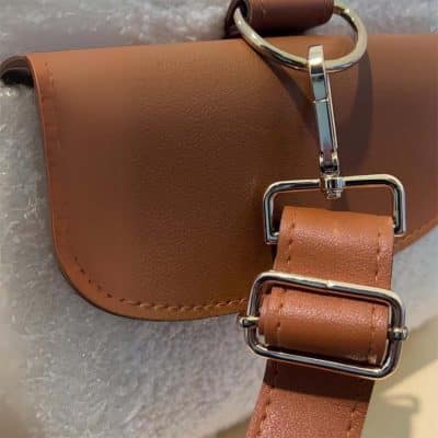 CarryAll Nappy Caddy showing the leather strap